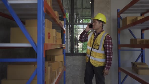 Handsome Asian Employee Works Warehouse Workers Wearing High Visibility Clothes — Wideo stockowe