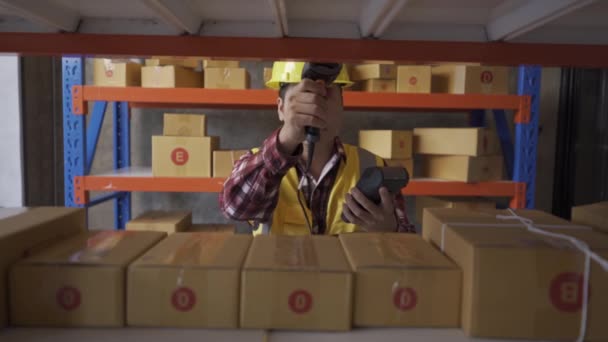 Handsome Asian Employee Works Warehouse Workers Wearing High Visibility Clothes — Stockvideo