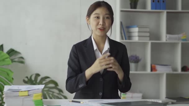 Close Asian Businesswoman Using Calculator Tax Calculator Chart Graph Reports — Stock Video