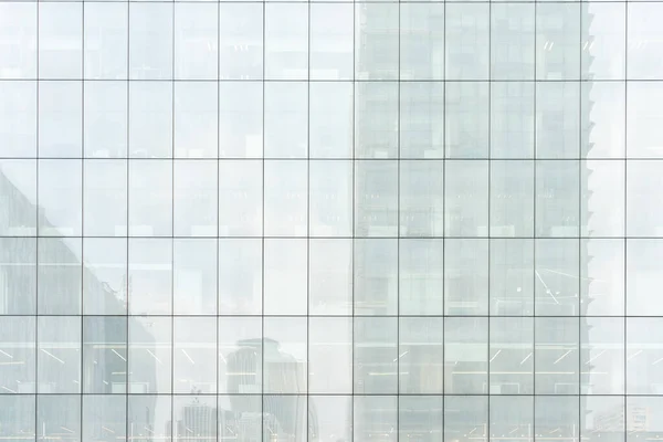 facade of a glass building - futurist background.