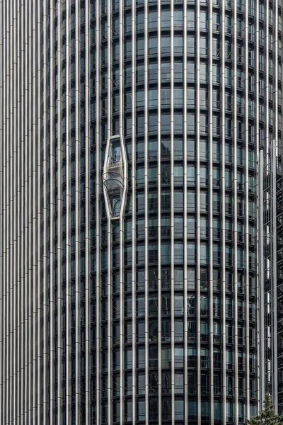 facade of a glass building - futurist background.