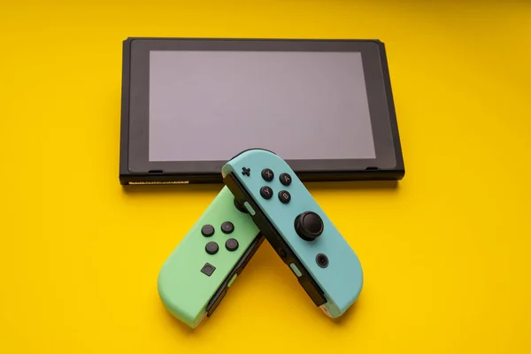 Nintendo Switch Special Edition Yellow Background — Stock Photo, Image