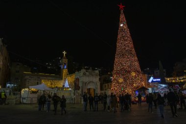light decorations and christmas trees during new year celebration in Nazareth city in 2021