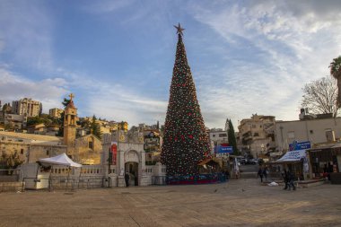 light decorations and christmas trees during new year celebration in Nazareth city in 2021