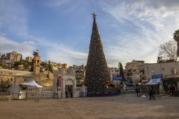 light decorations and christmas trees during new year celebration in Nazareth city in 2021