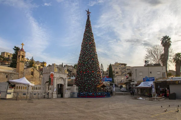 light decorations and christmas trees during new year celebration in Nazareth city in 2021