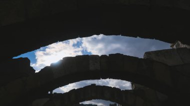 Silhouettes - backlit arches inside the ancient city of Smyrna, Izmir, Turkey