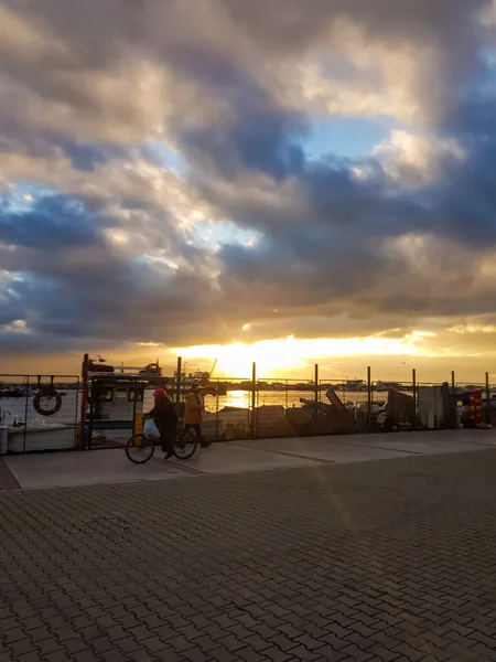 Izmir, Turkey, 5th of January 2022 - Sidewalk at the Aegean Sea during sunset on the coast of Izmir with copy space