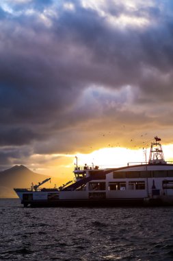 Ship on the Aegean Sea during sunset on the coast of Izmir with copy space