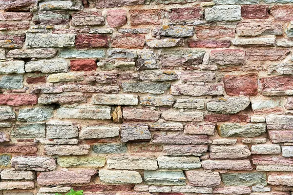 Bakgrund från förstörd tegelvägg — Stockfoto