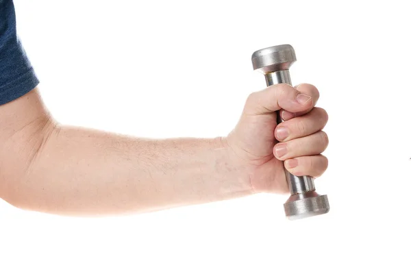 Hand holds a metal dumbbell on a white background — Fotografia de Stock