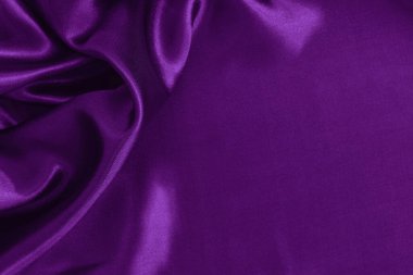 Purple fabric cloth texture for background and design art work, beautiful crumpled pattern of silk or linen.	