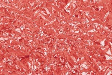 Gül sarısı folyo yaprak parlak doku, arkaplan ve tasarım için soyut pembe ambalaj kağıdı.