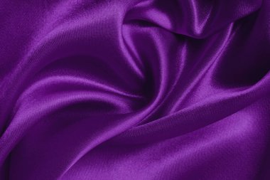 Arka plan ve tasarım için mor kumaş dokusu, güzel buruşmuş ipek ya da keten deseni..