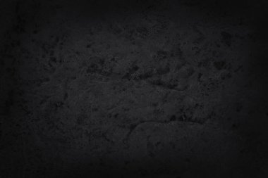 Arka plan ve tasarım çalışmaları için yüksek çözünürlüklü doğal desenli koyu gri kayrak dokusu. Siyah taş duvar.