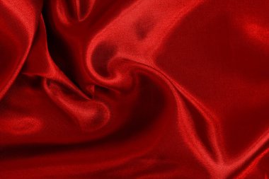 Arka plan ve tasarım için kırmızı kumaş dokusu, güzel buruşmuş ipek ya da keten deseni.
