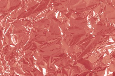 Gül sarısı folyo yaprak parlak doku, arkaplan ve tasarım için soyut pembe ambalaj kağıdı.