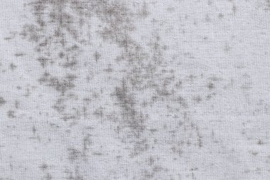 Fungus on fabric, texture of old white cotton with black mold spots and dirty.