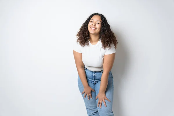 Studio portrait of beautiful brunette young dark-skinned woman — Stock Photo, Image