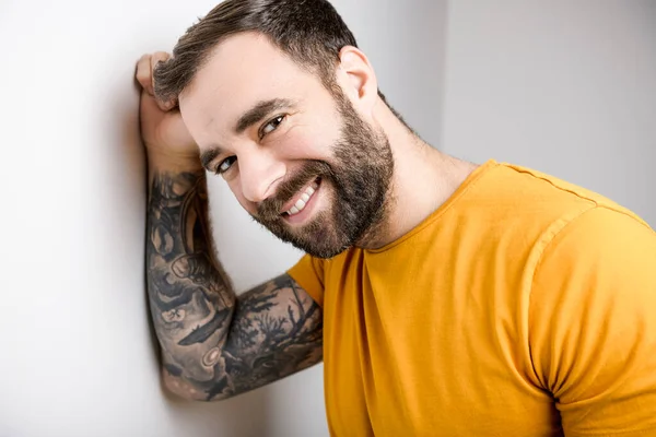 Portrait Casual Young Man Beard Tattoo Burnt Orange Shirt White — 스톡 사진