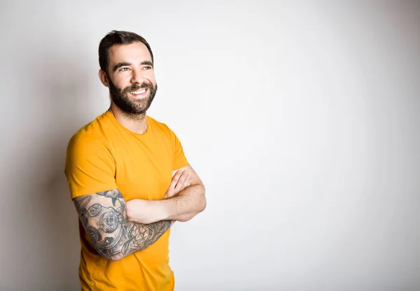 Portrait Casual Young Man Beard Tattoo Burnt Orange Shirt White — ストック写真