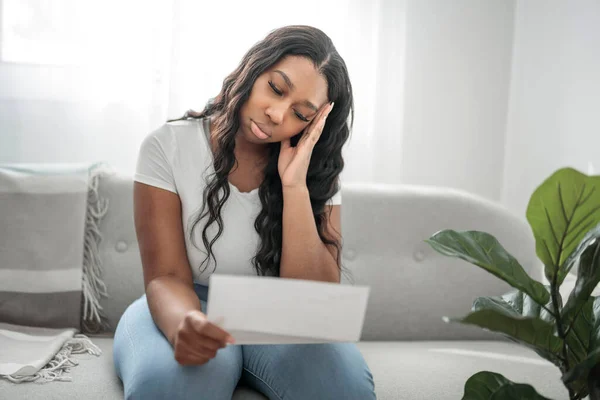 Attractive Young African Woman Sitting Couch Home Stress Problem Bill — Foto Stock