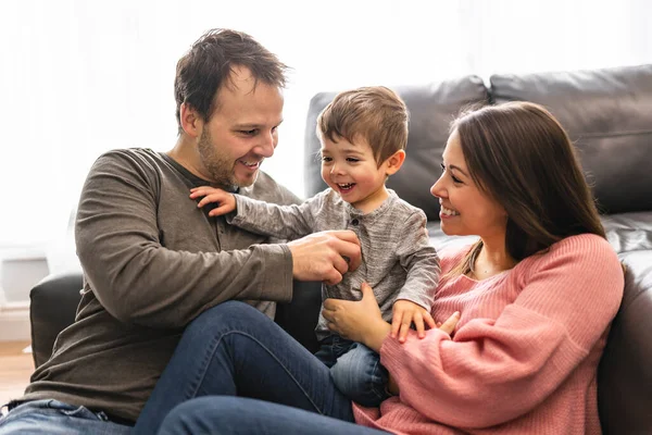 Happy family mother and father having fun with child son at home — Photo