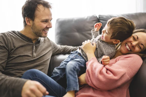 Happy family mother and father having fun with child son at home — Foto de Stock