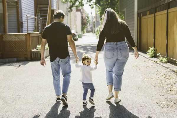 Young family with cute two years old child outside — Stock Photo, Image