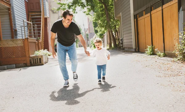 Man with cute two years old child outside — Stock Photo, Image