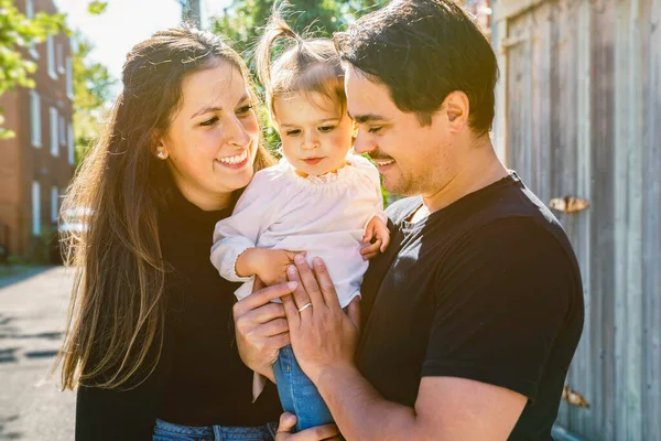 Young family with cute two years old child outside — Stock Photo, Image