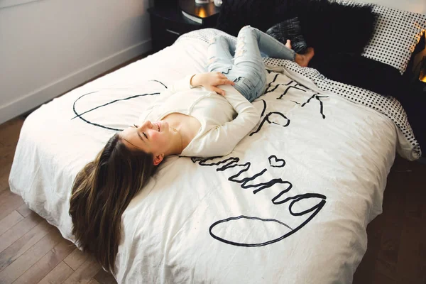 Teen spending time relaxing on bedroom at home —  Fotos de Stock