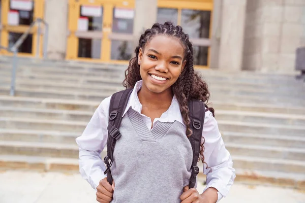 Cute black teenager university student on campus with backpack — Stockfoto