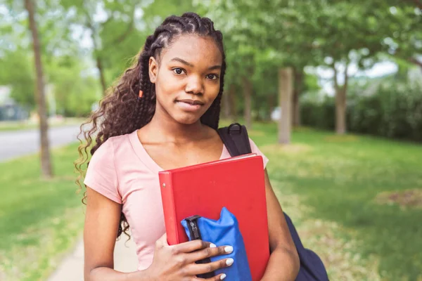 Cute black teenager university student on campus with backpack — Stockfoto