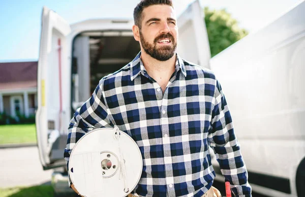 Portrait of an electrician happy worker at work — Stockfoto