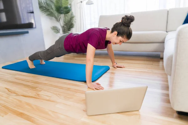 Attractive Fit woman Exercise at home on the living room — Stock Photo, Image
