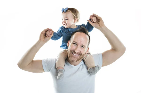 Portrait of father with his baby daughter on his shoulder — Stockfoto
