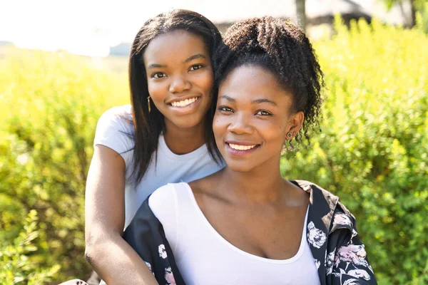 Latin American Mother with her Daughter together Stock Obrázky