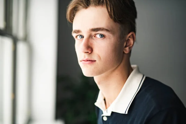 A young teen handsome man portrait at home —  Fotos de Stock
