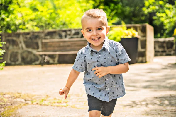 Happy boy child enjoying time at the park — Fotografia de Stock
