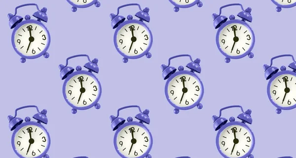 Purple alarm clocks pattern on purple background, very peri color of 2022 — Fotografia de Stock