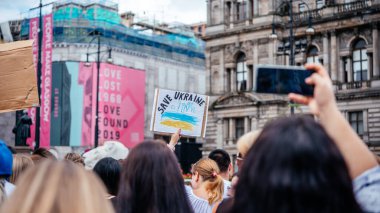 Glasgow, Scotalnd - July 30, 2022 Anti-Russia protest with participants calling for Russia to be recognised as a terrorist state, war in Ukraine