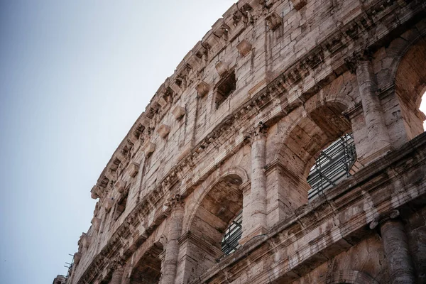 Exterior view of facade of Colosseum in Rome Italy, UNESCO World Heritage Site. Coloseo, Flavian Amphitheater the symbol of ancient Roman Empire