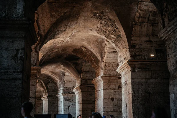 The interior walls and arched walls of Colosseum in Rome Italy, UNESCO World Heritage Site. Coloseo, Flavian Amphitheater the symbol of ancient Roman Empire