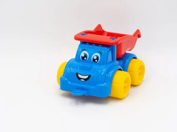 Smiling Children Toy Plastic Car White Background — Zdjęcie stockowe