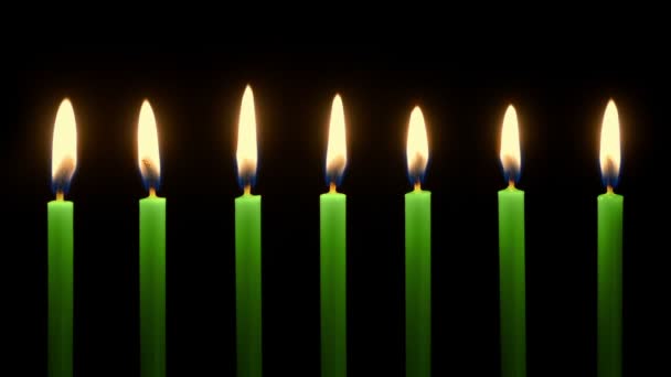 Green Candles Row Burning Dark — Stock Video