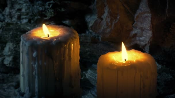 Large Candles Blown Out Rock Wall — Vídeo de Stock