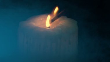 Candle Lit In Smoky Dark Setting