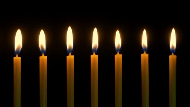 Candles Burning Row Dark — Stock Video