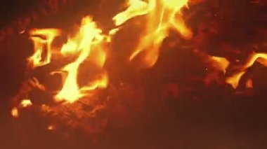 Smoky Camp Fire Burning At Night